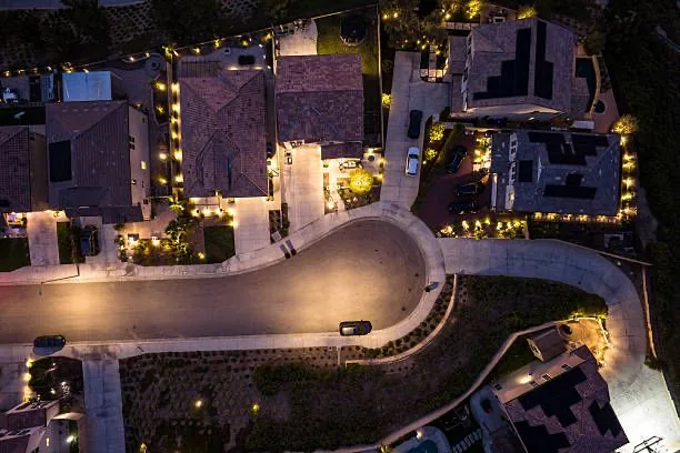 Residential street seen from above at dusk